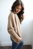 Long sleeve ribbed knit open front sweater cardigan with tapered fit sleeve. So flattering! 